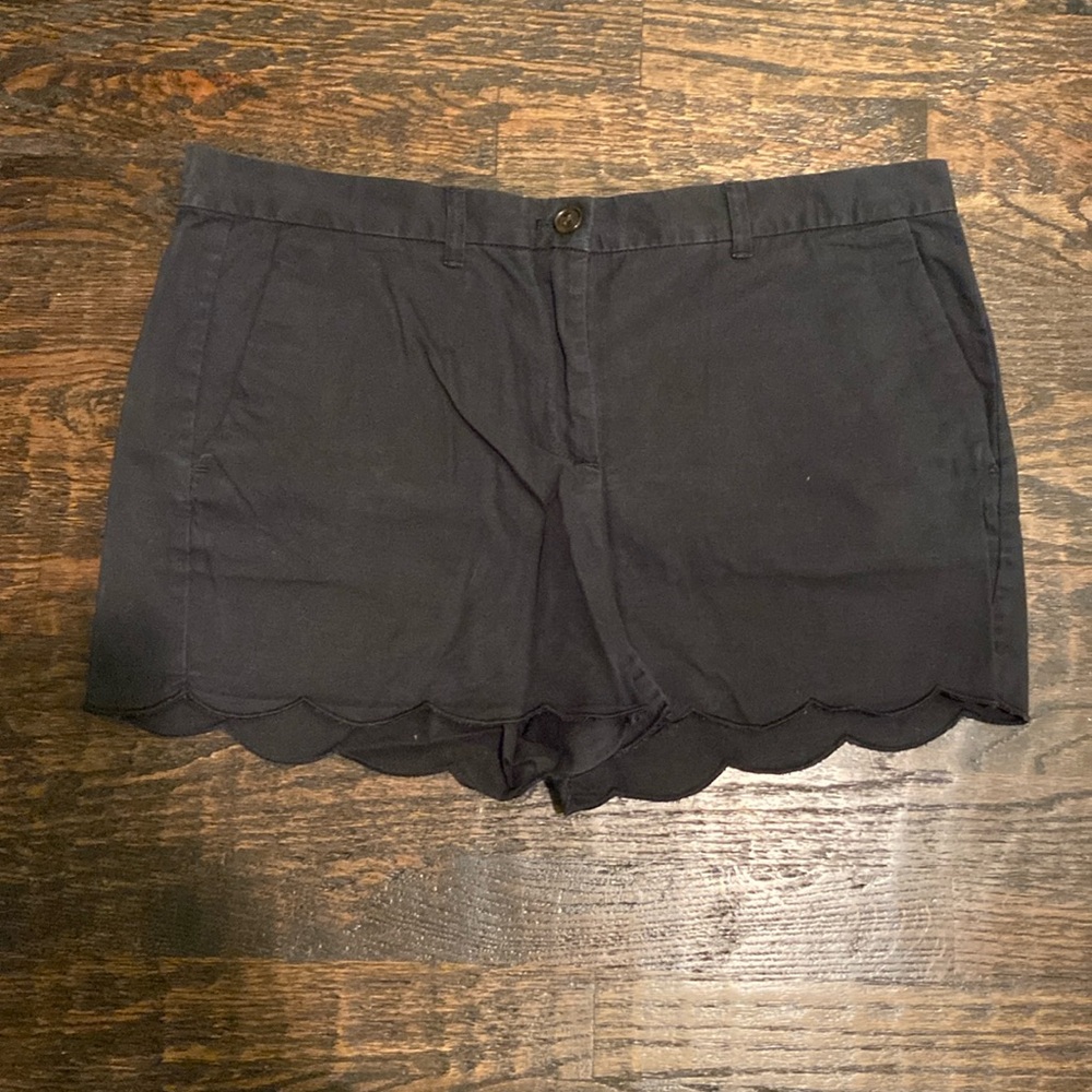 Black shorts with scalloped trim